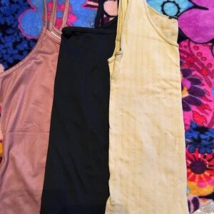 Trio of Sleeveless tanks in Black, Pink, and Tan